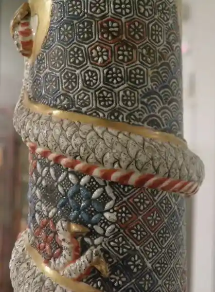 Vase, cross with rays, geometrically derived cross